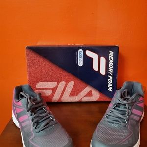 Tennis shoes by Fila, worn once.  Very comfortable with memory foam and cool max